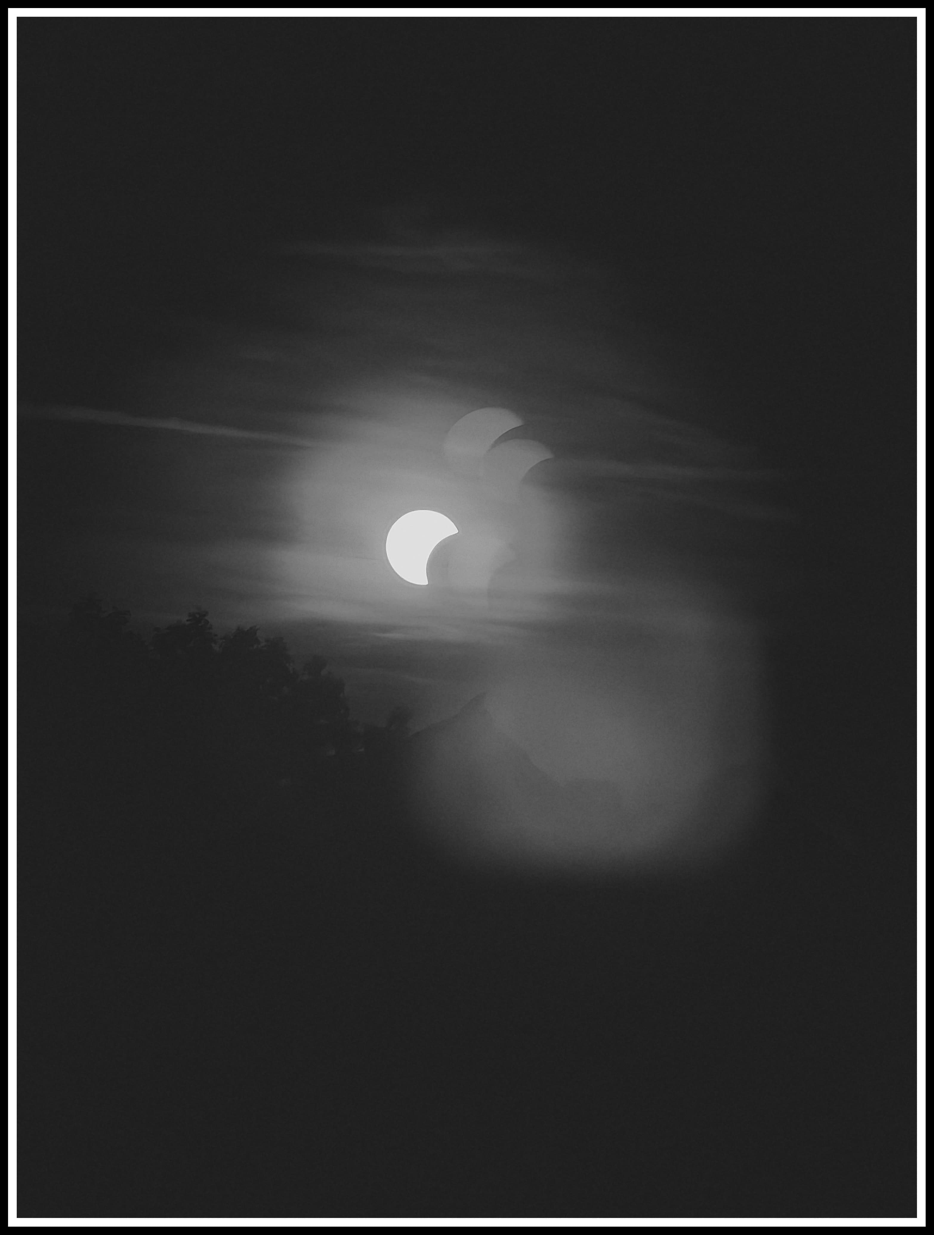 solar eclipse sun with several reflections